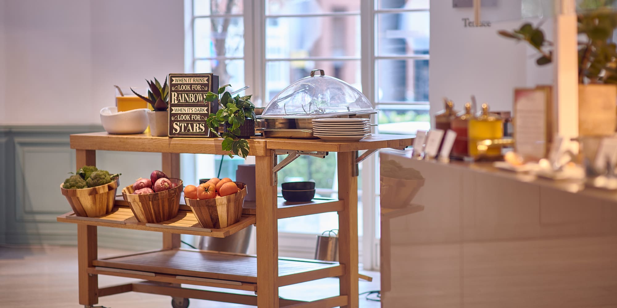a kitchen cart with food on it