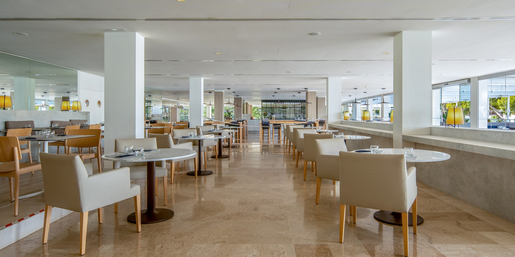 a room with tables and chairs