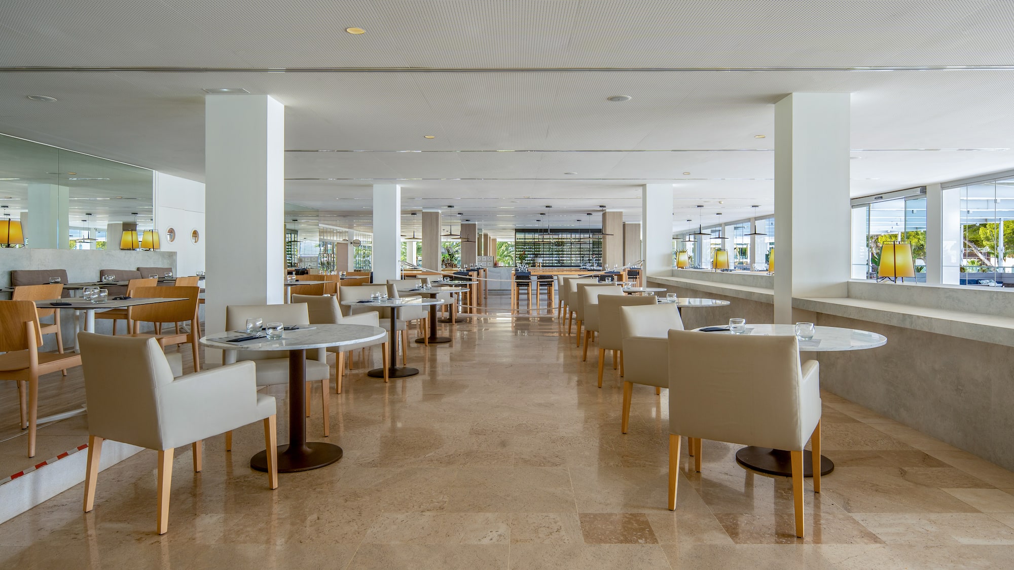 a room with tables and chairs