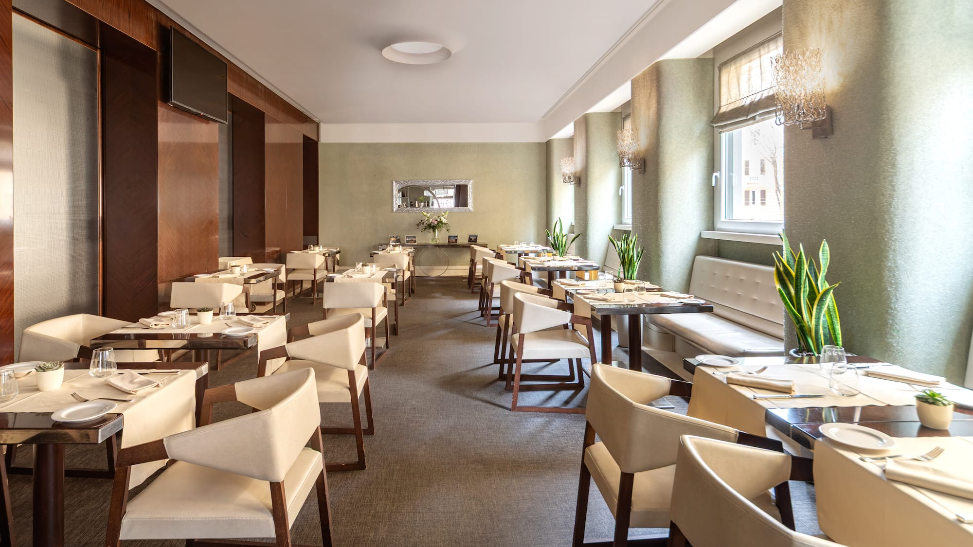 a room with tables and chairs