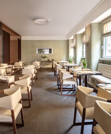 a room with tables and chairs