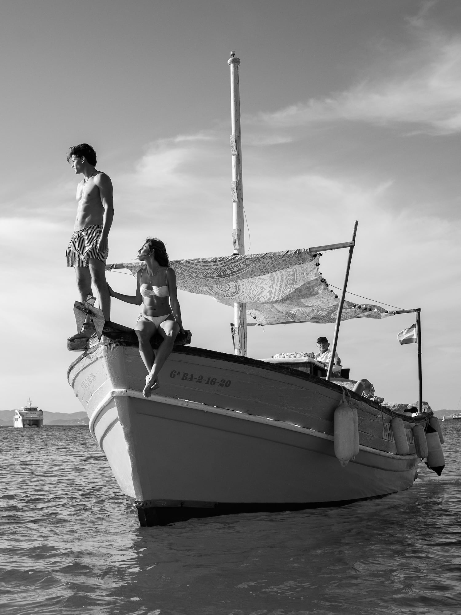 a man and woman on a boat