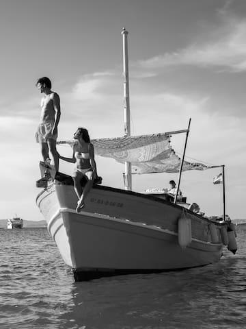 a man and woman on a boat