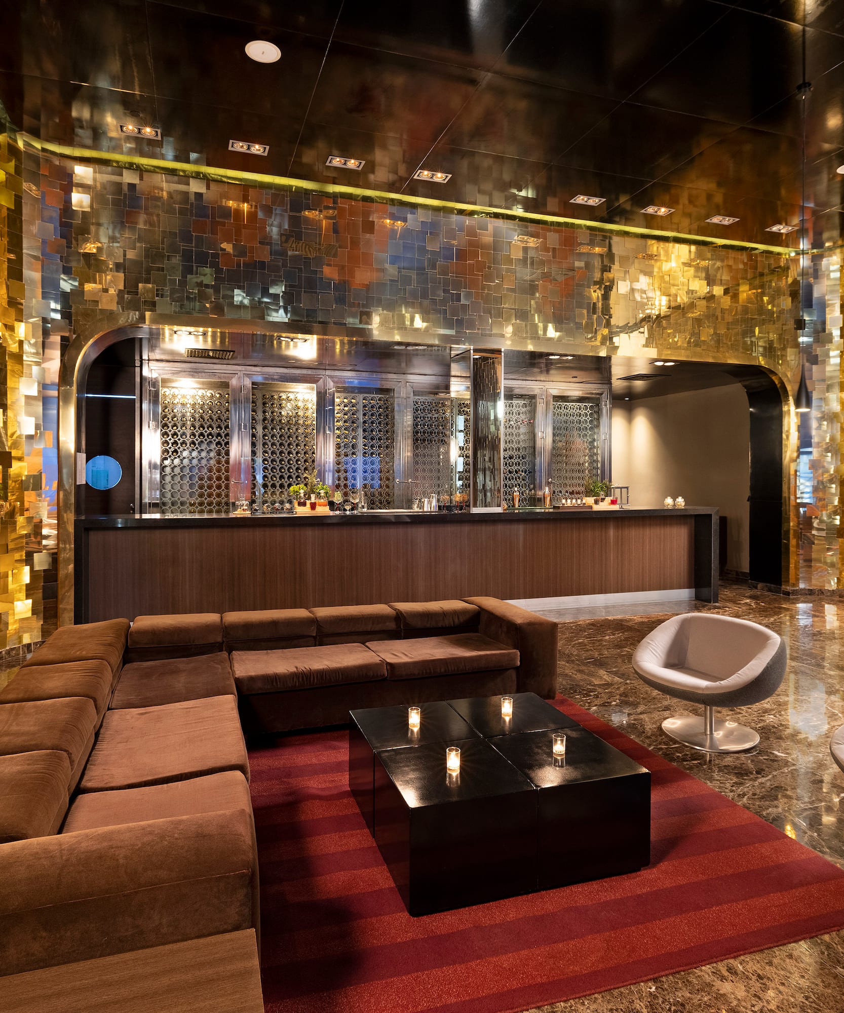 a room with a large couch and a table