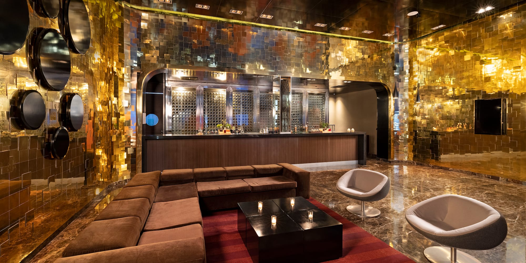 a room with a large couch and a table