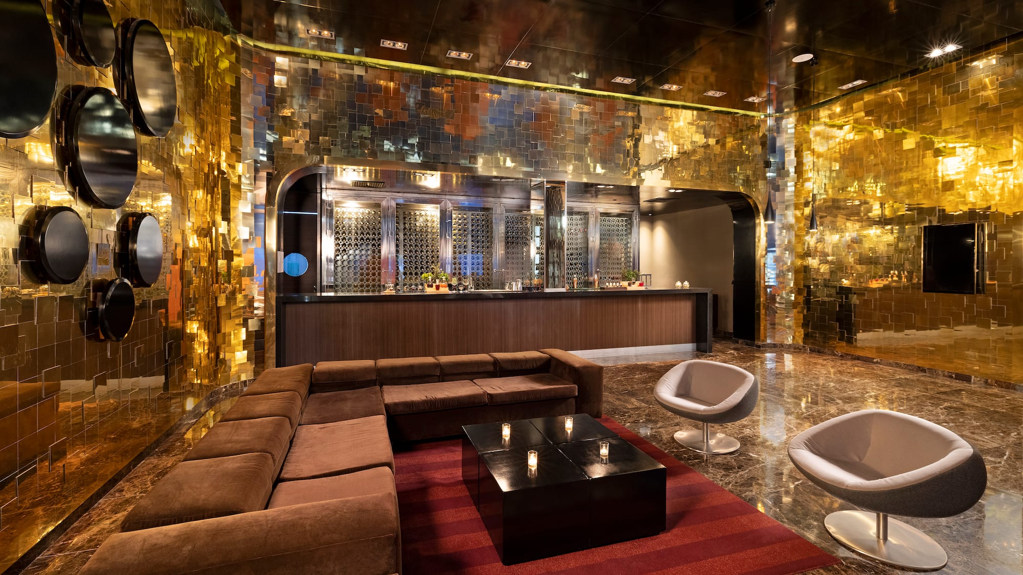 a room with a large couch and a table