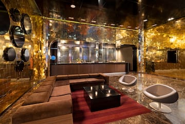 a room with a large couch and a table