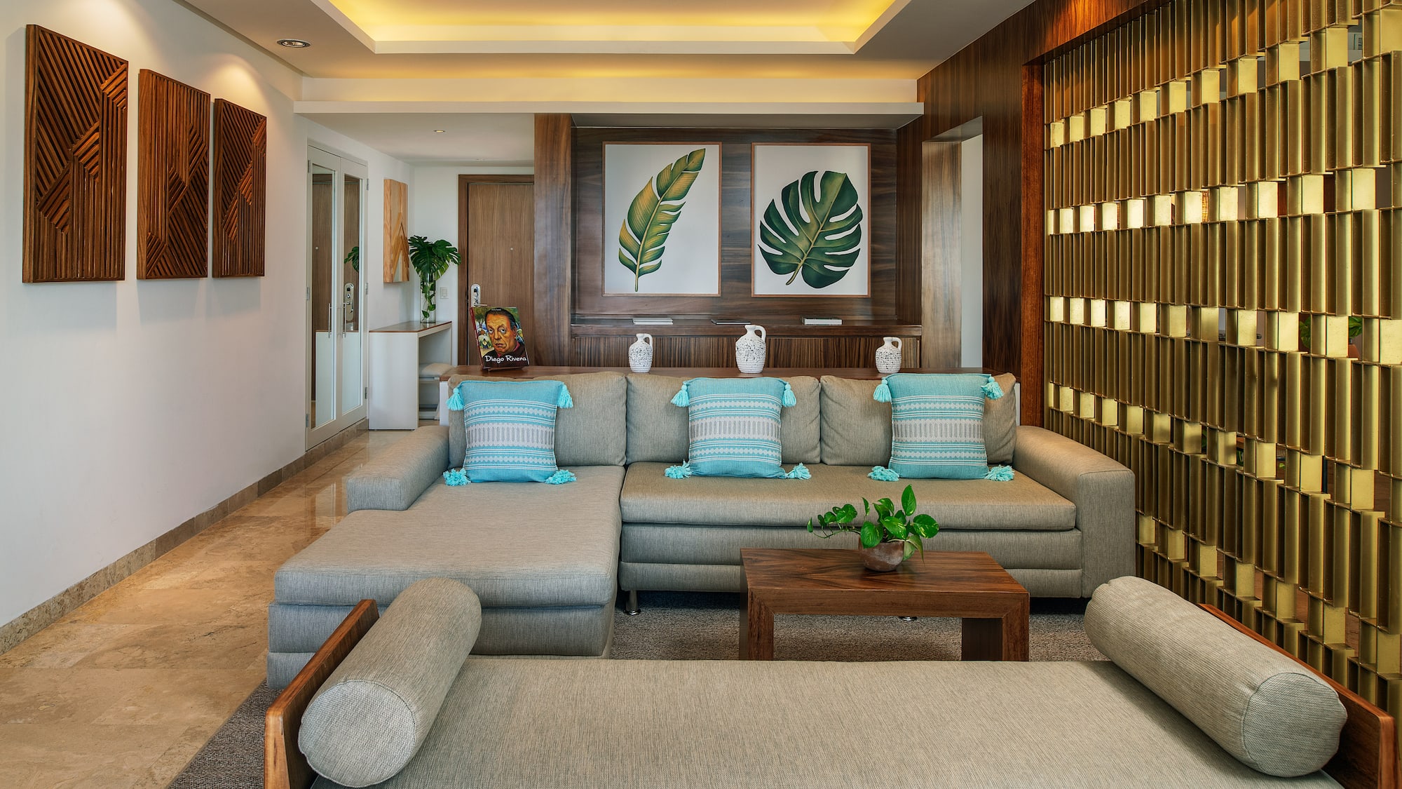 a living room with a large couch and a table