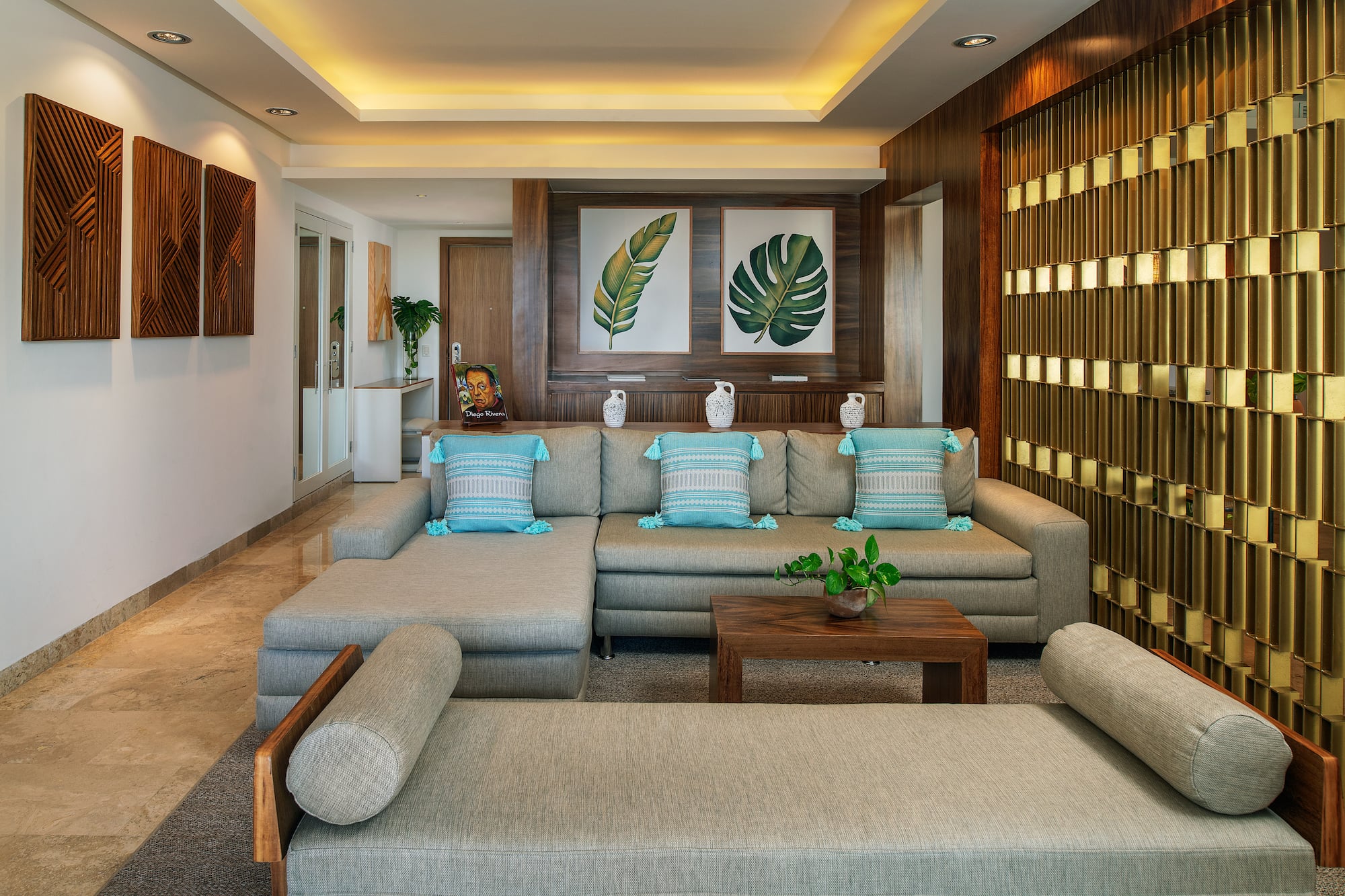 a living room with a large couch and a table