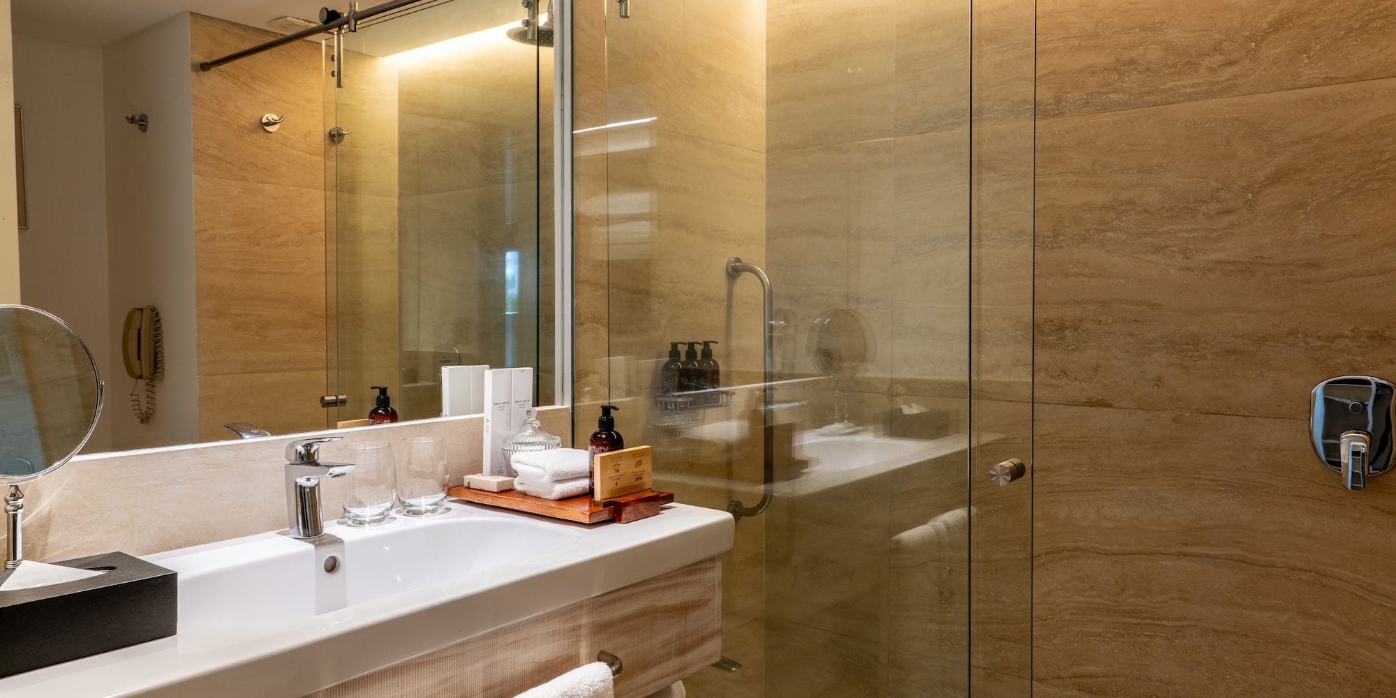 a bathroom with a glass shower