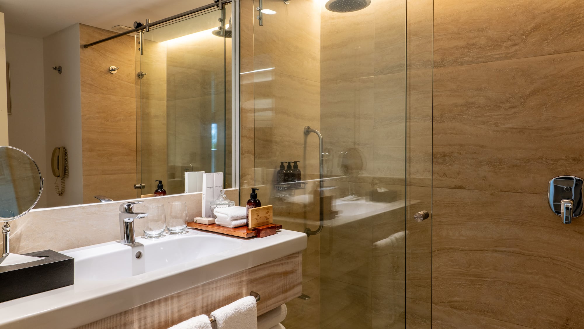 a bathroom with a glass shower