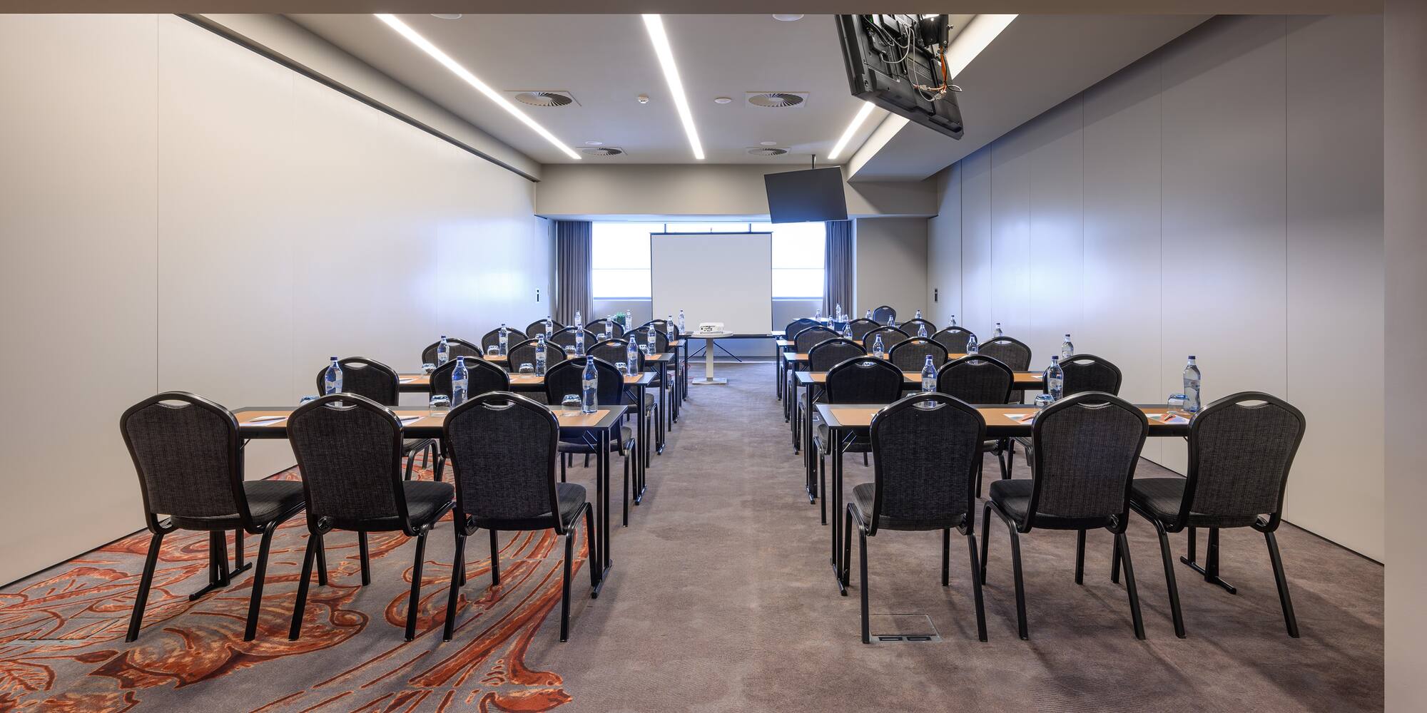 a room with tables and chairs