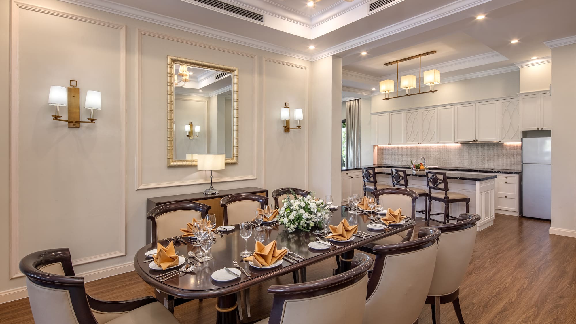 a dining room with a table and chairs