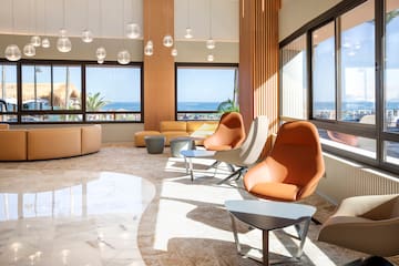 a room with chairs and tables