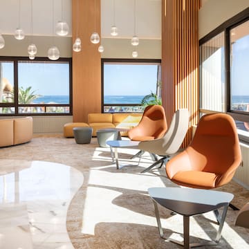 a room with chairs and tables