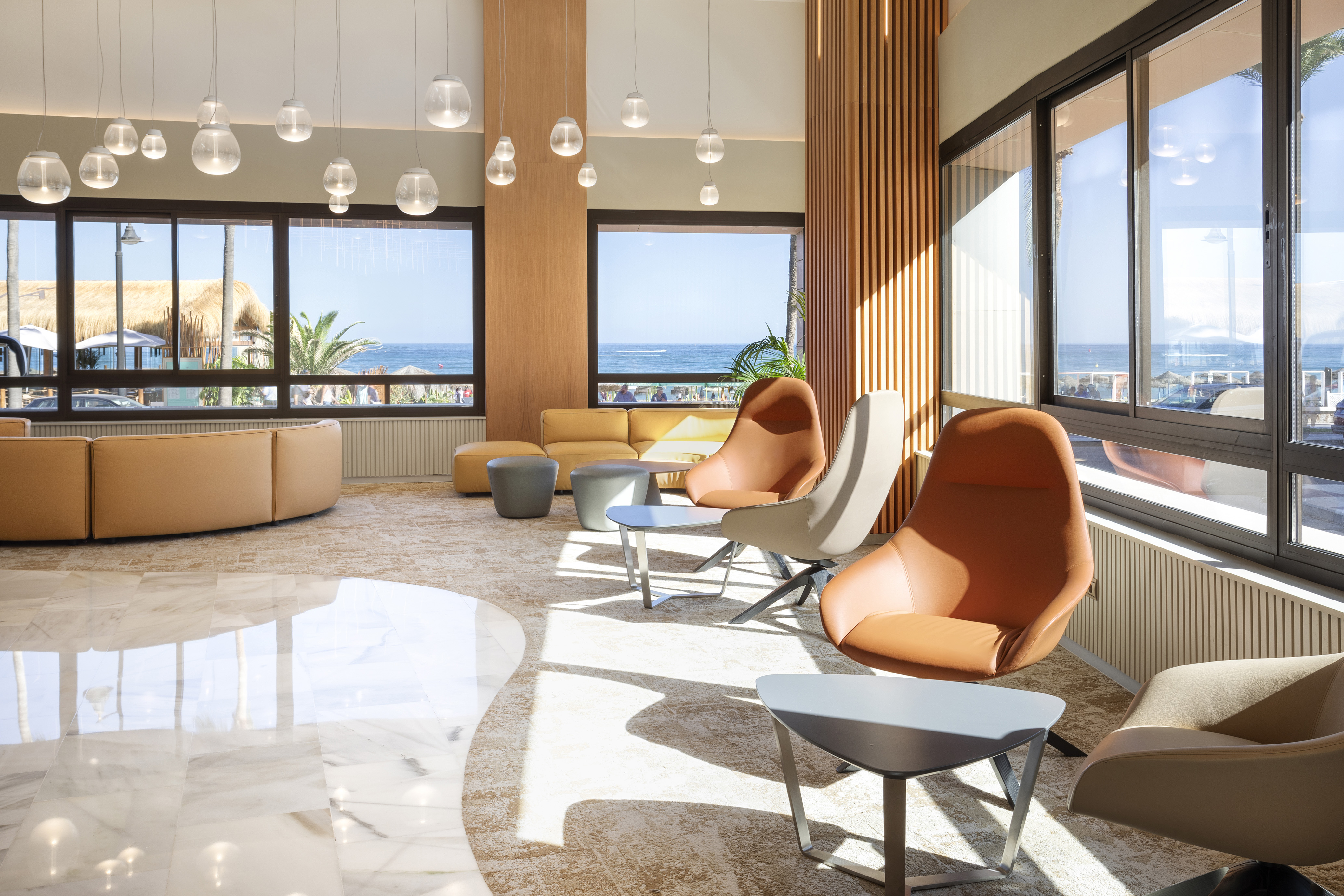 a room with chairs and tables