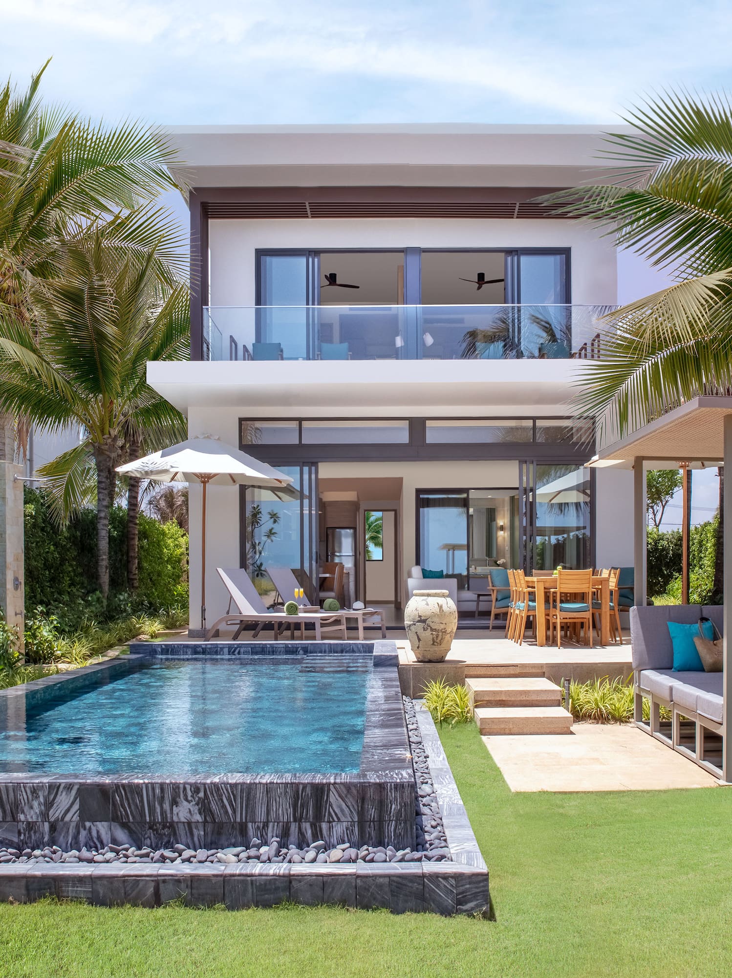 a pool in front of a house