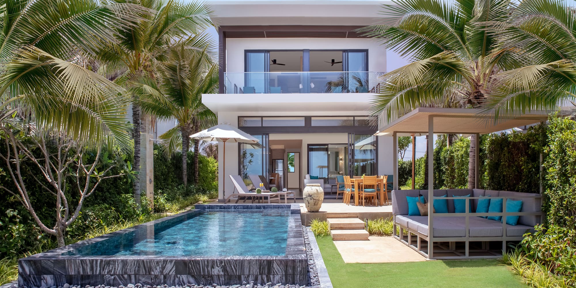 a pool in front of a house