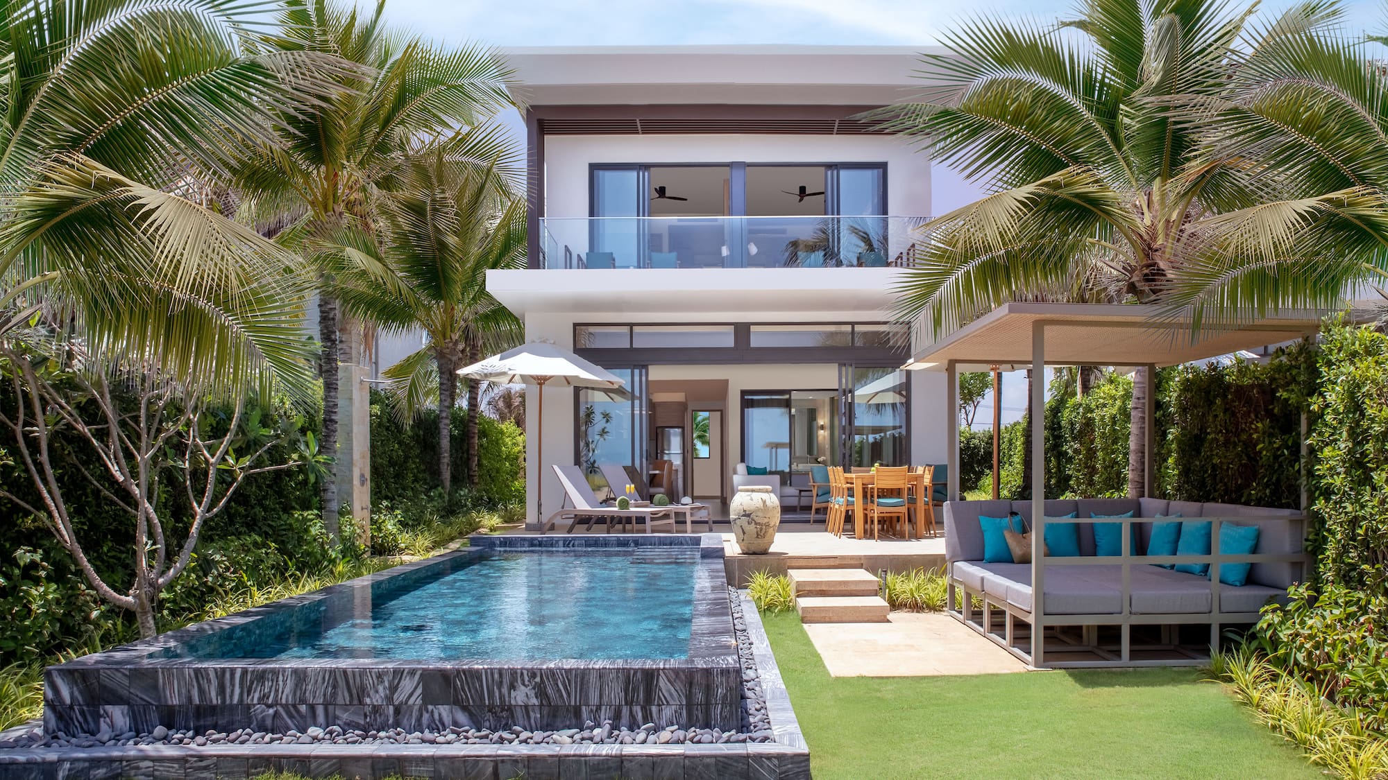 a pool in front of a house