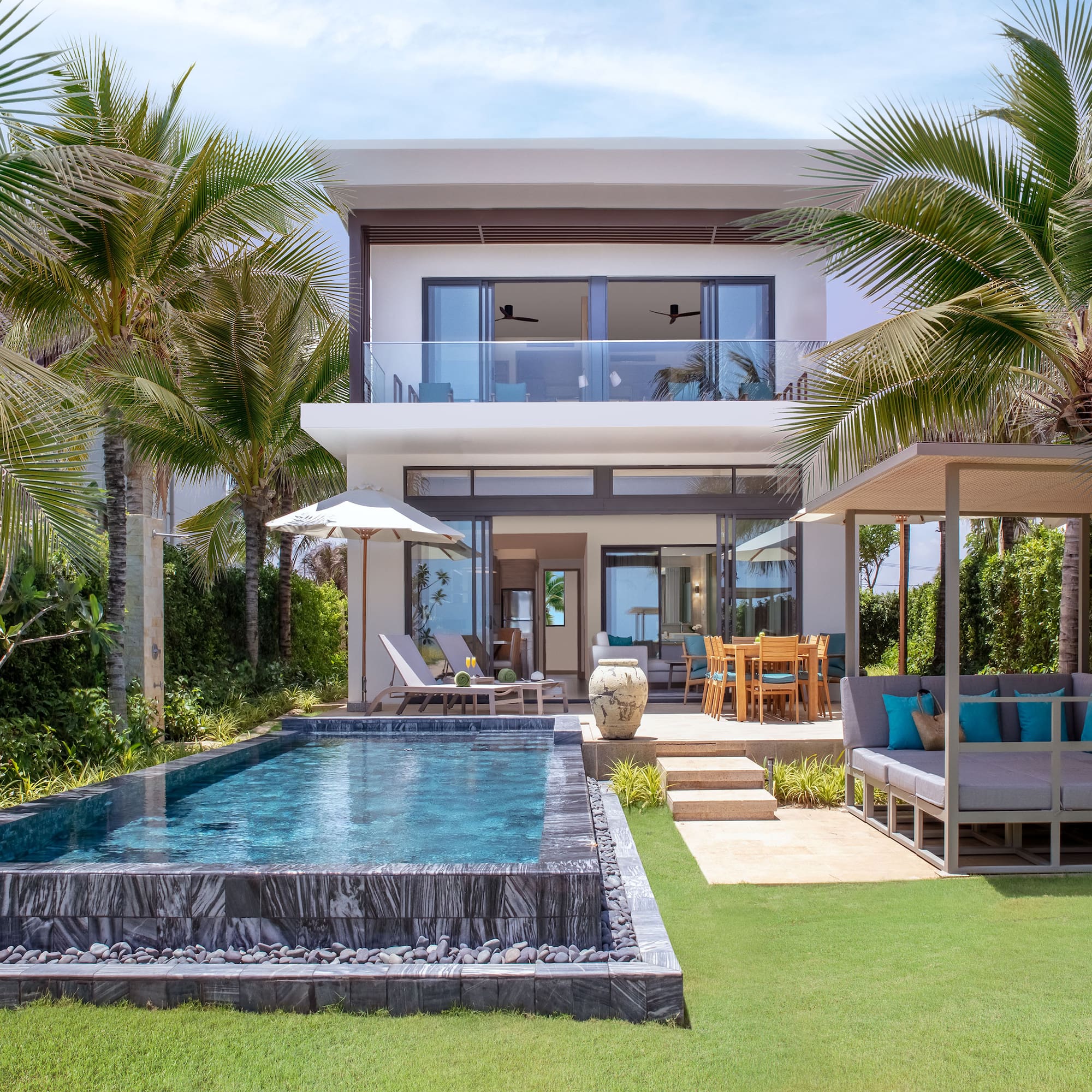 a pool in front of a house