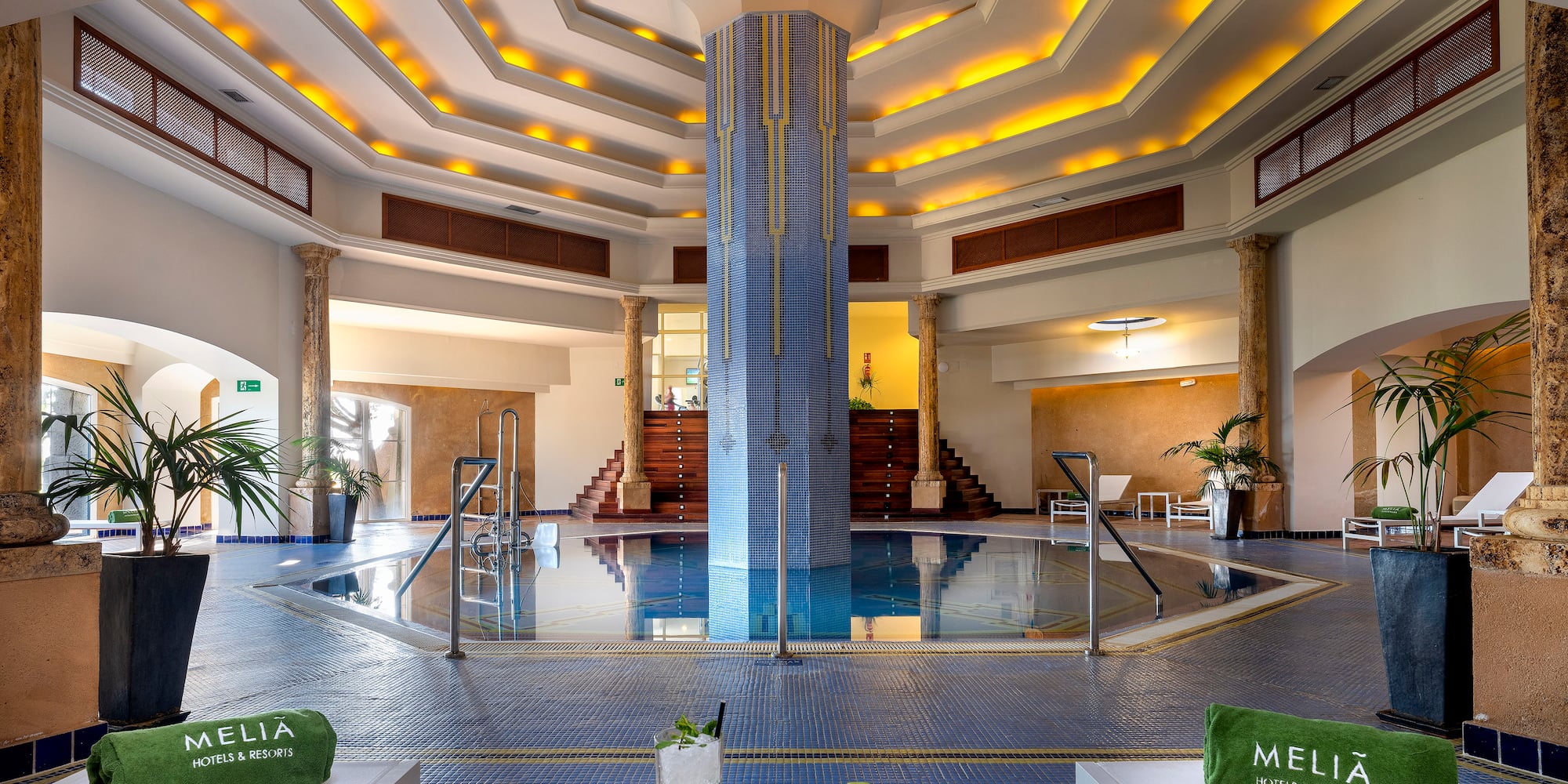 a pool inside a hotel
