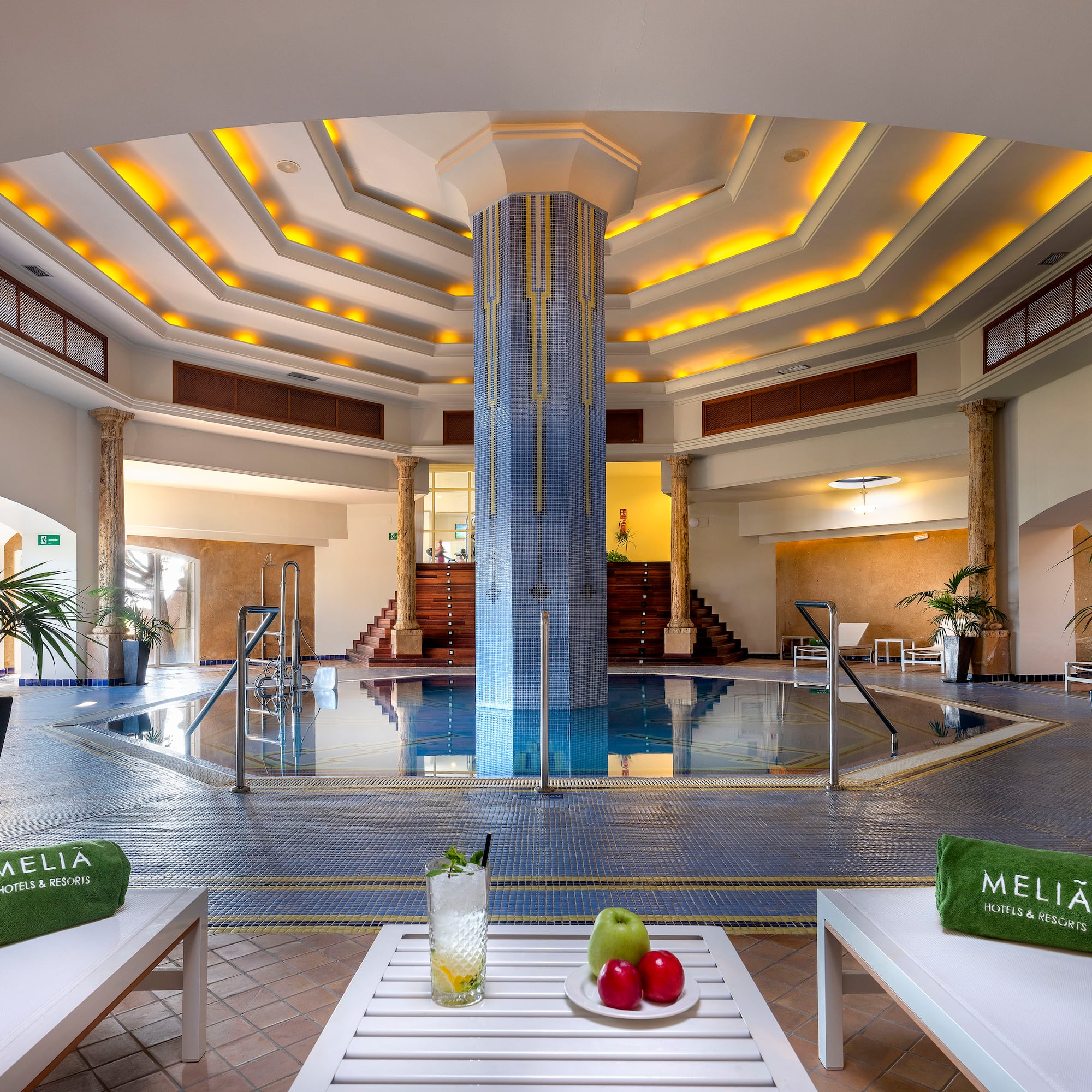 a pool inside a hotel