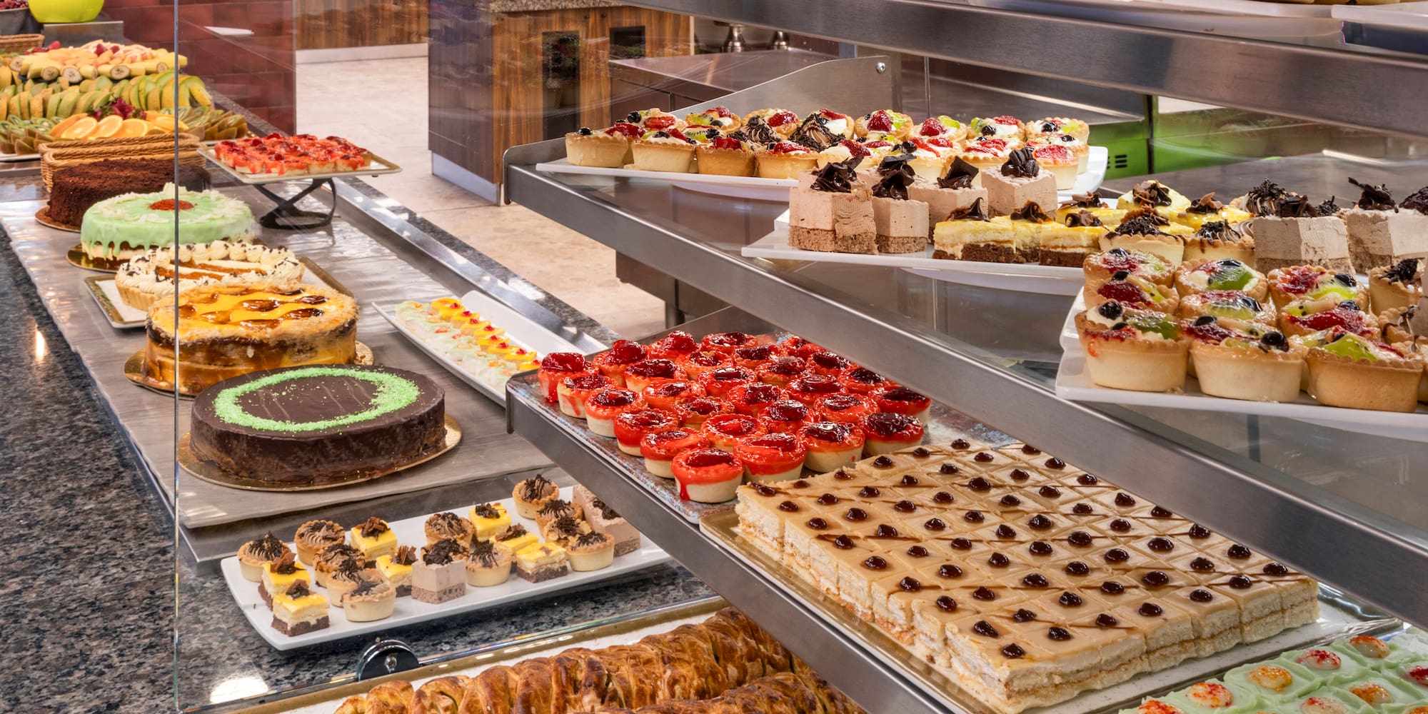 a display of cakes and pastries