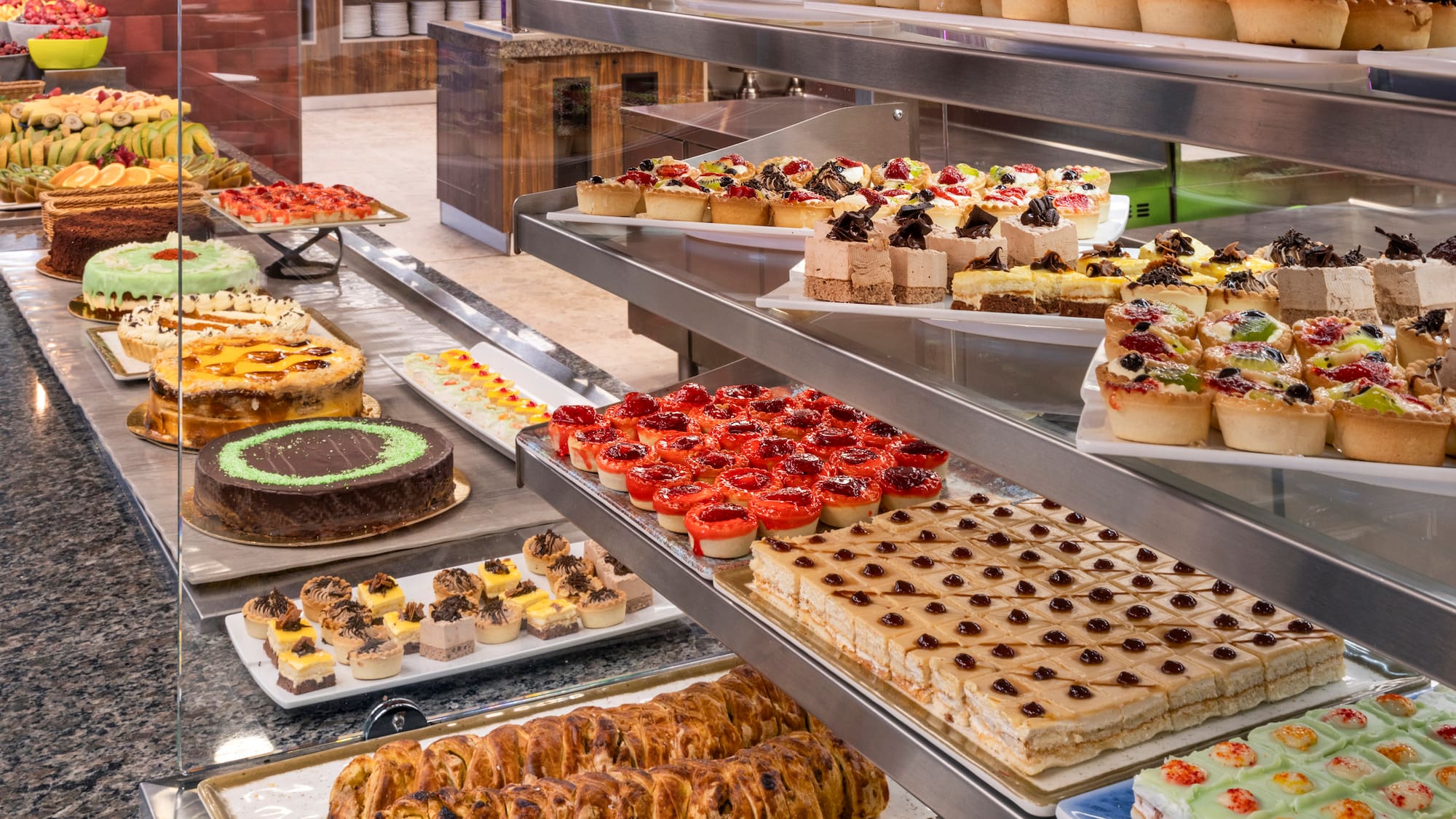 a display of cakes and pastries