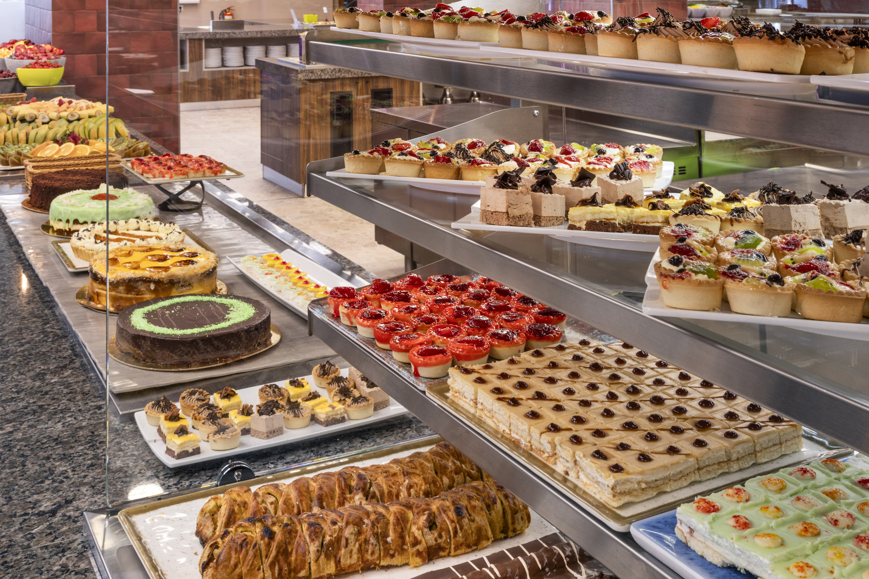 a display of cakes and pastries