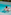Child in striped inflatable ring floating in clear blue swimming pool.