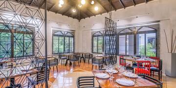 a room with tables and chairs