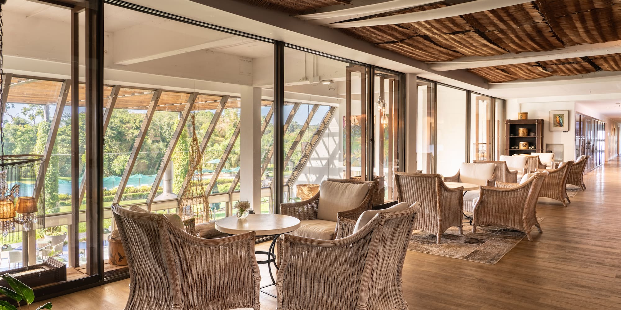 a room with wicker furniture and a table