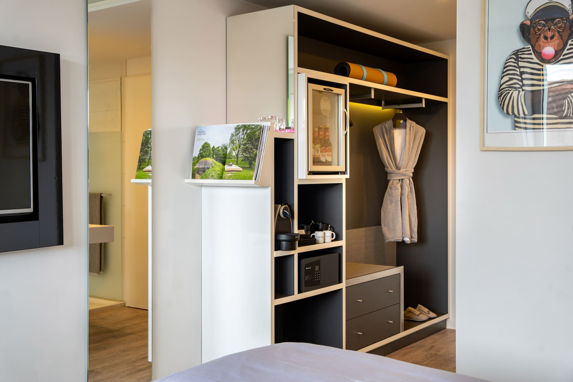 a room with a closet and a bed