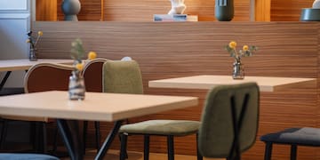 a room with tables and chairs