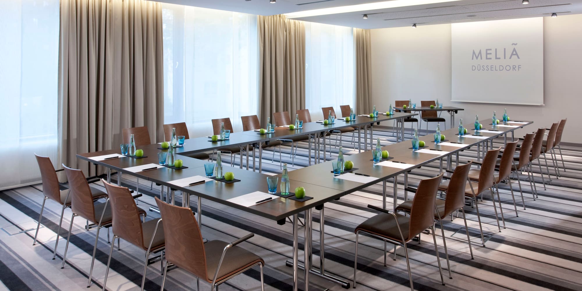 a room with tables and chairs