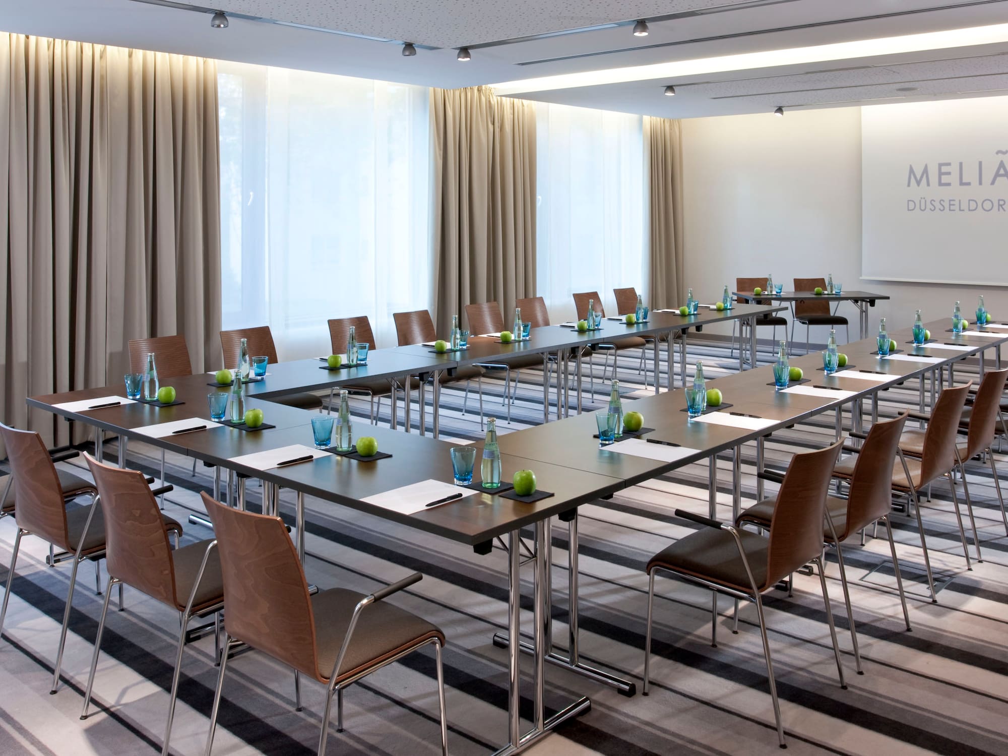 a room with tables and chairs