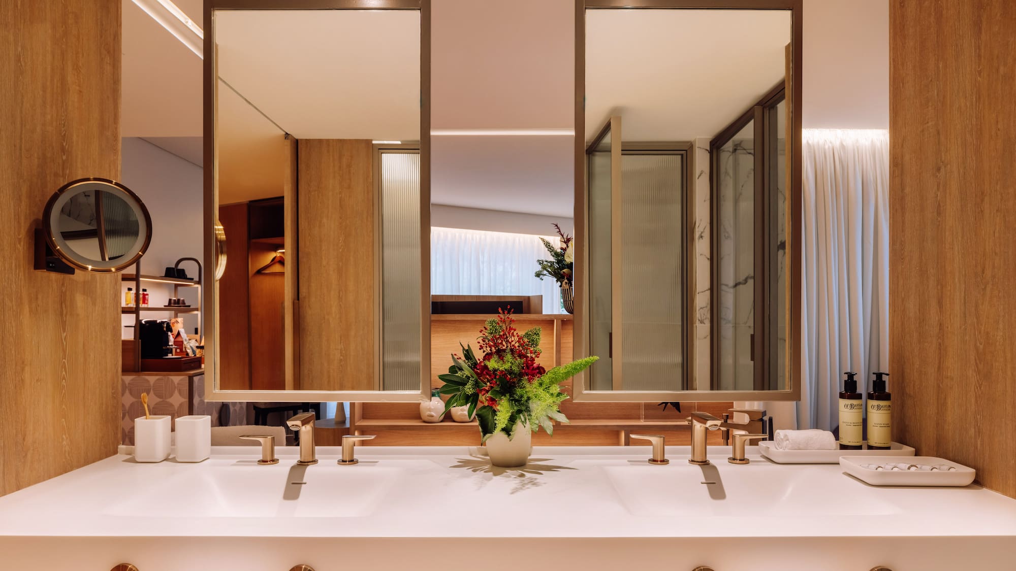 a bathroom with a plant on the counter