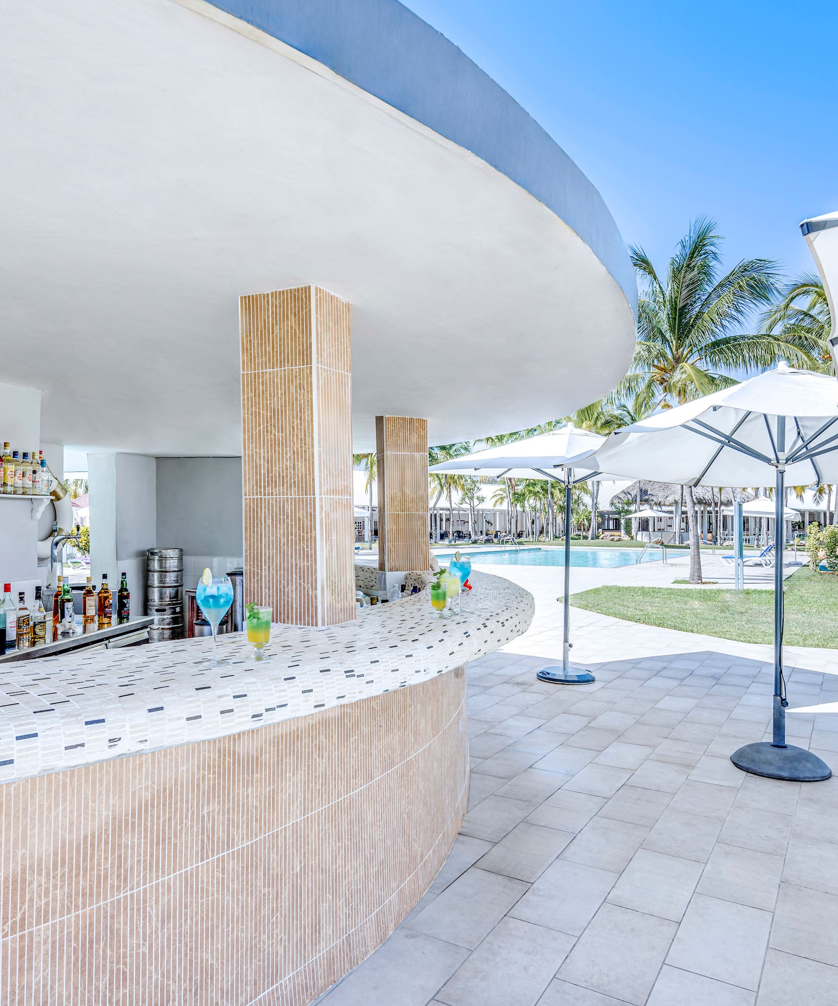 a bar with drinks on the counter