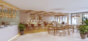 a room with tables and chairs