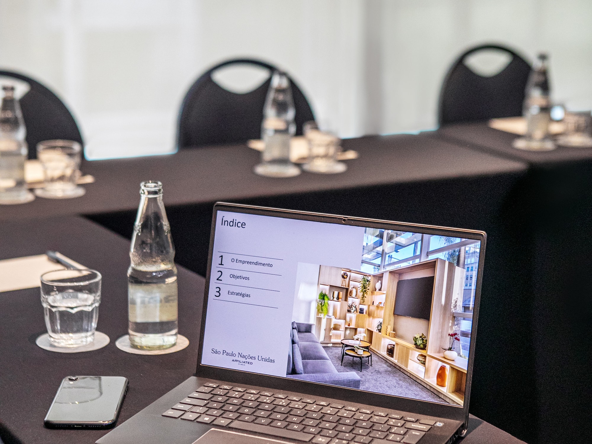 a laptop on a table with a screen on it