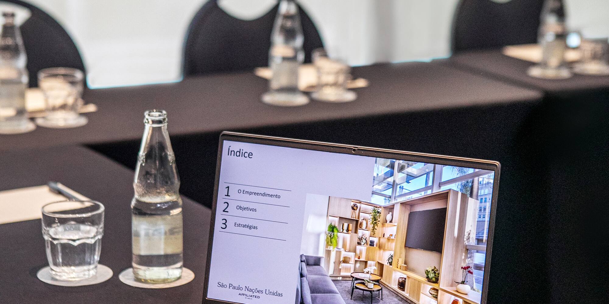 a laptop on a table with a screen on it