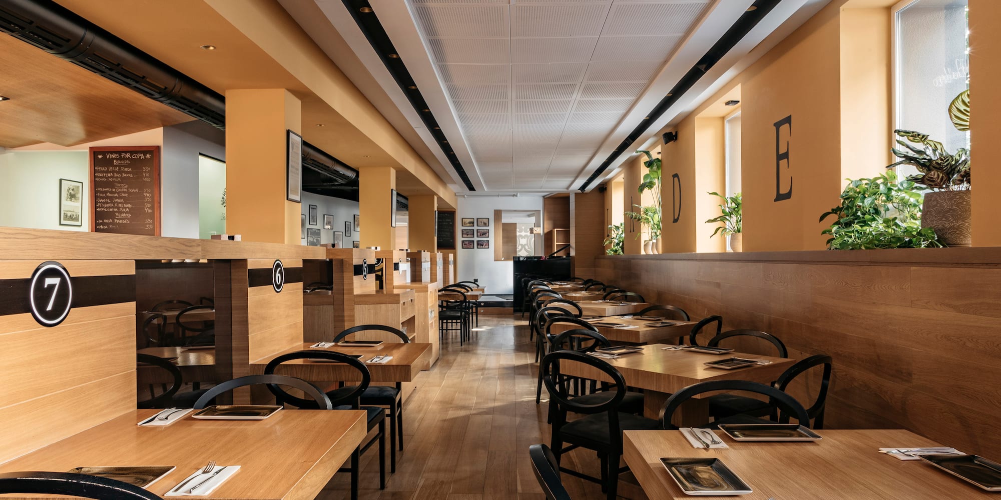 a room with tables and chairs