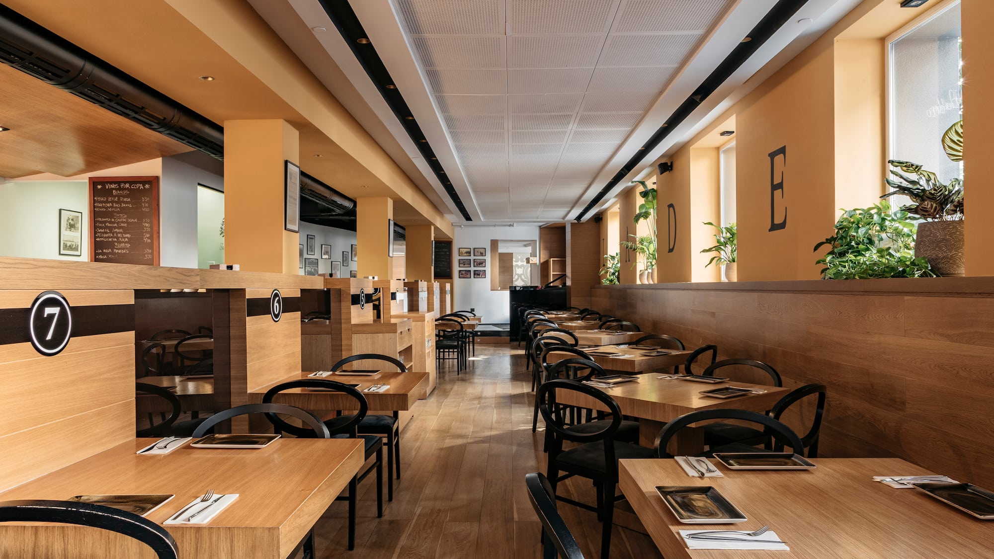 a room with tables and chairs