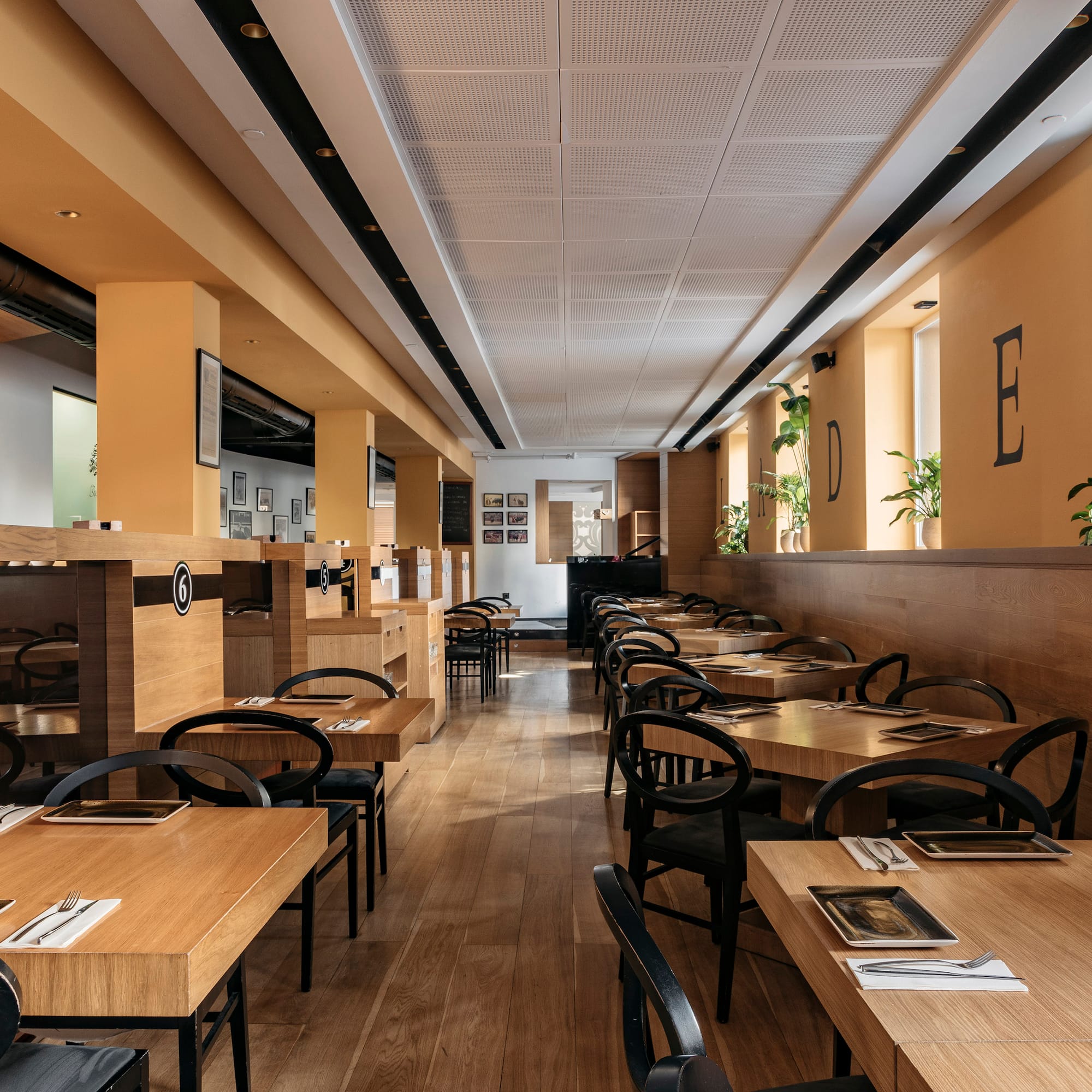 a room with tables and chairs