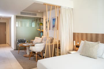 a room with a bed and a table