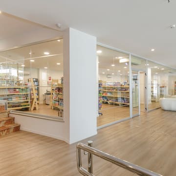 a store with glass walls and shelves