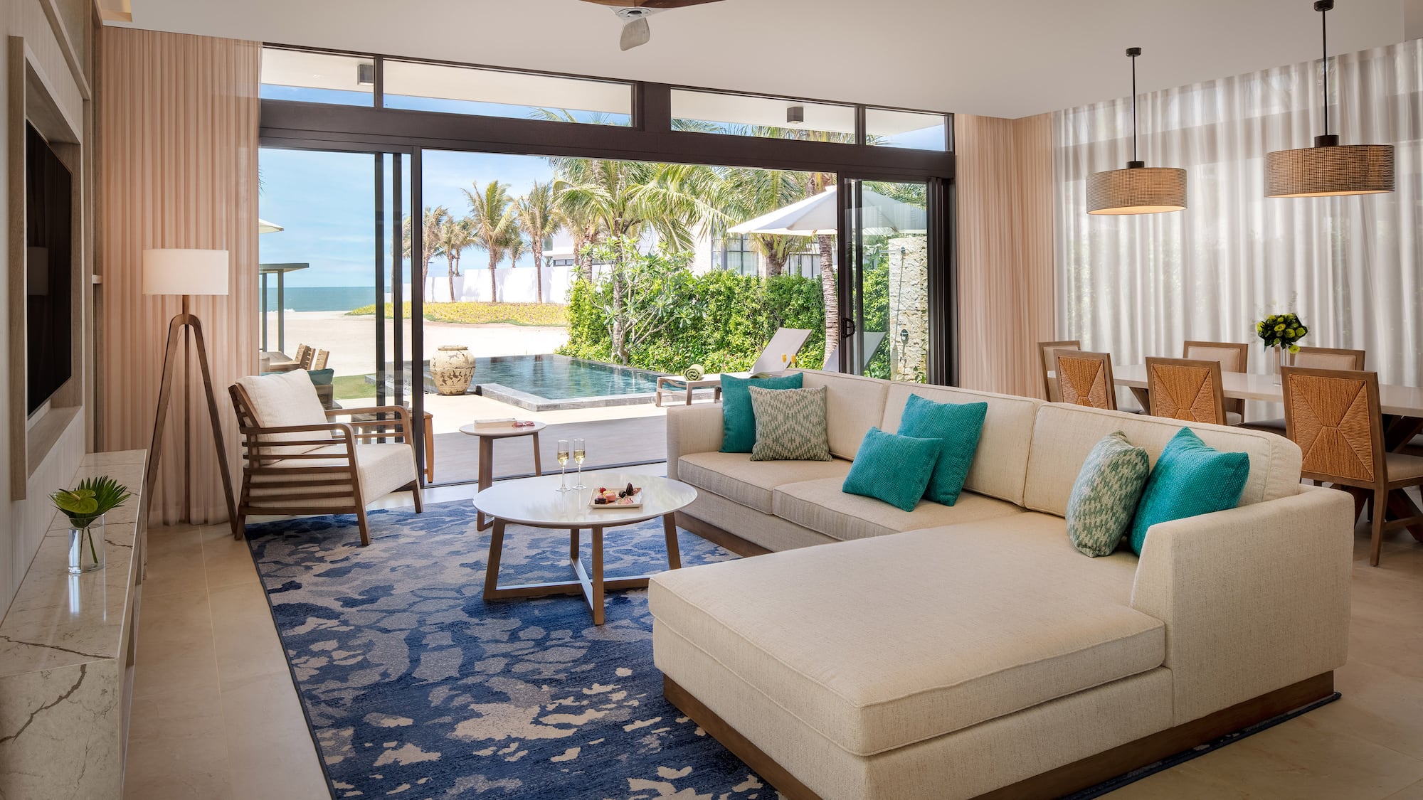 a living room with a large couch and a table