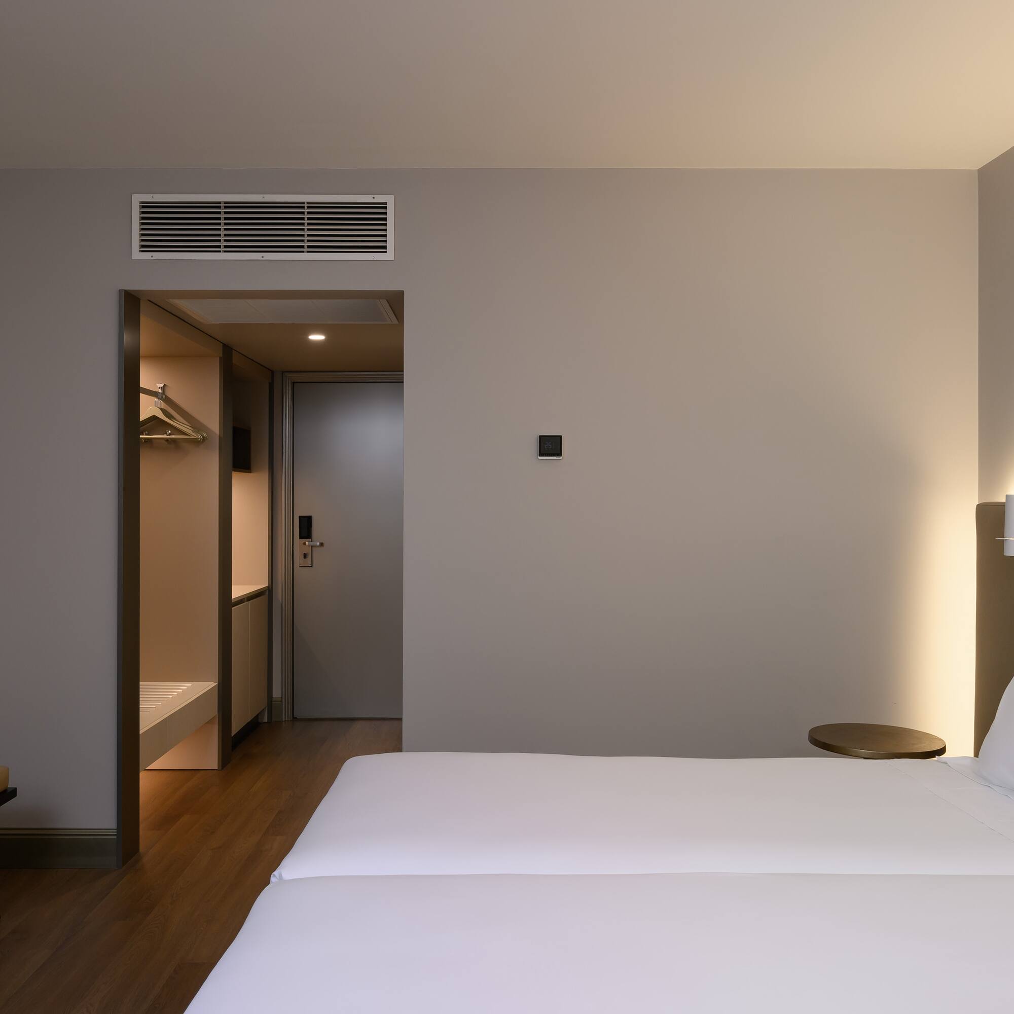 a room with a bed and a door