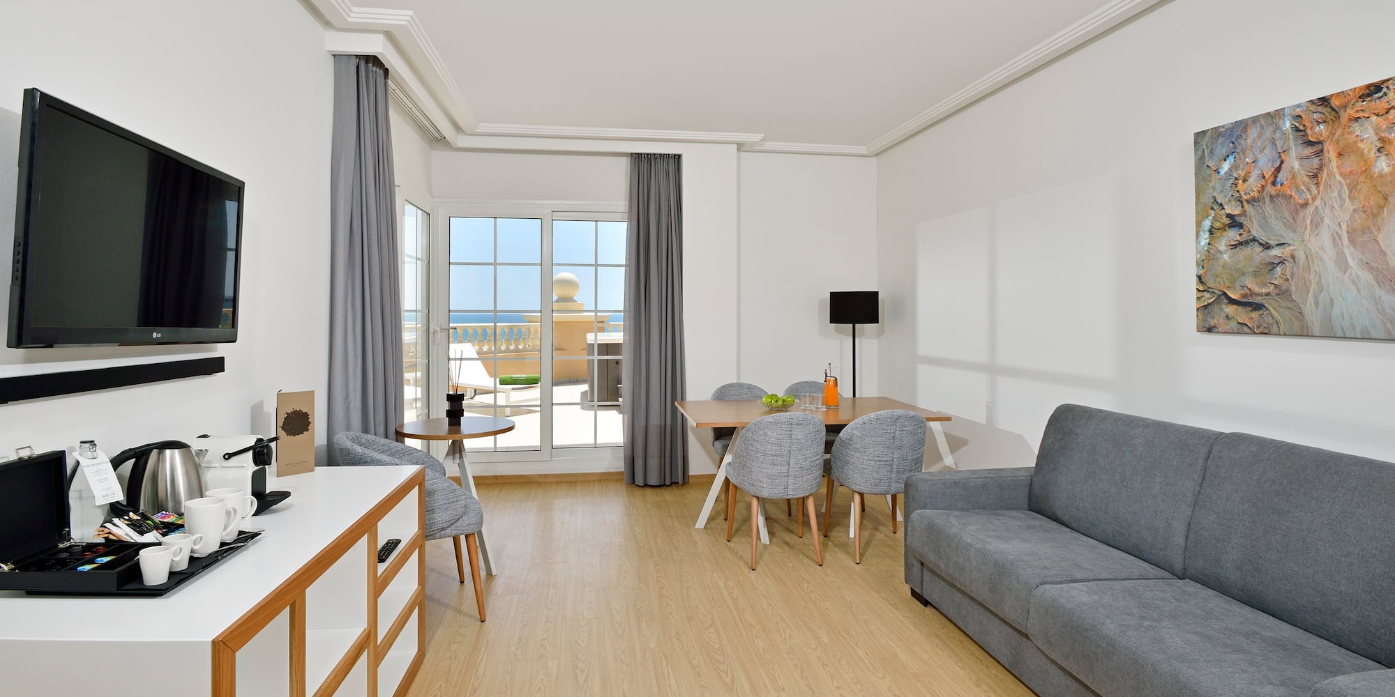 a living room with a couch and table