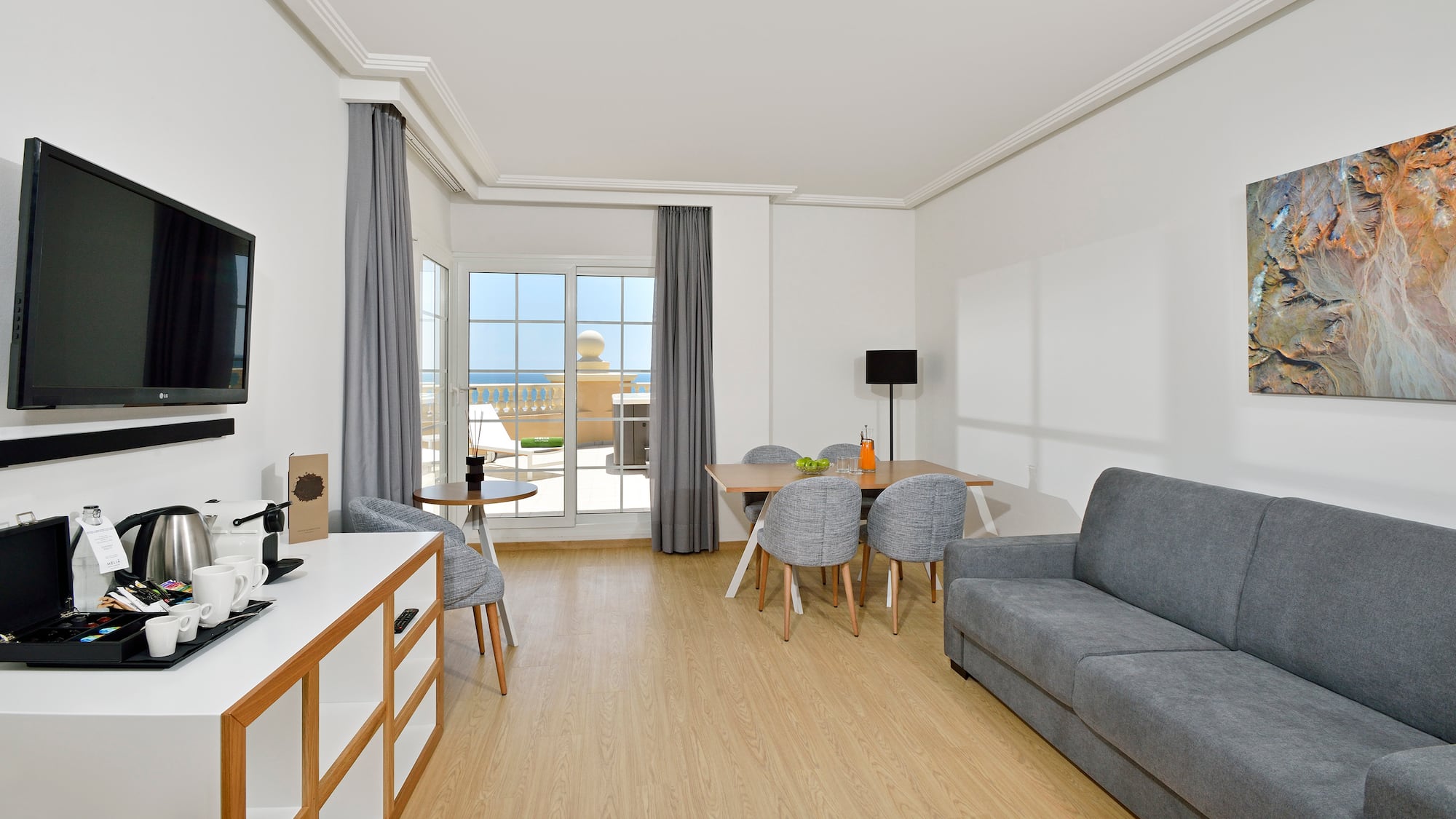 a living room with a couch and table